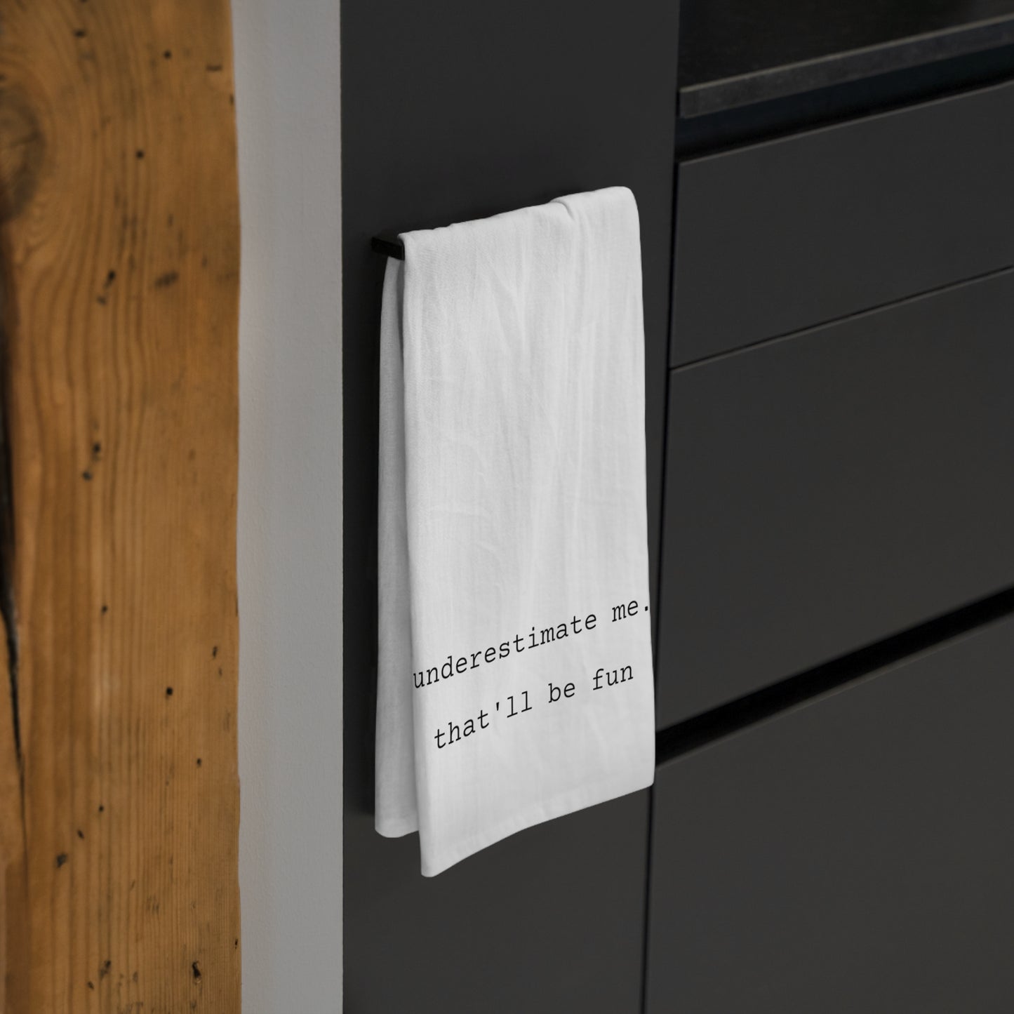underestimate me- tea towel