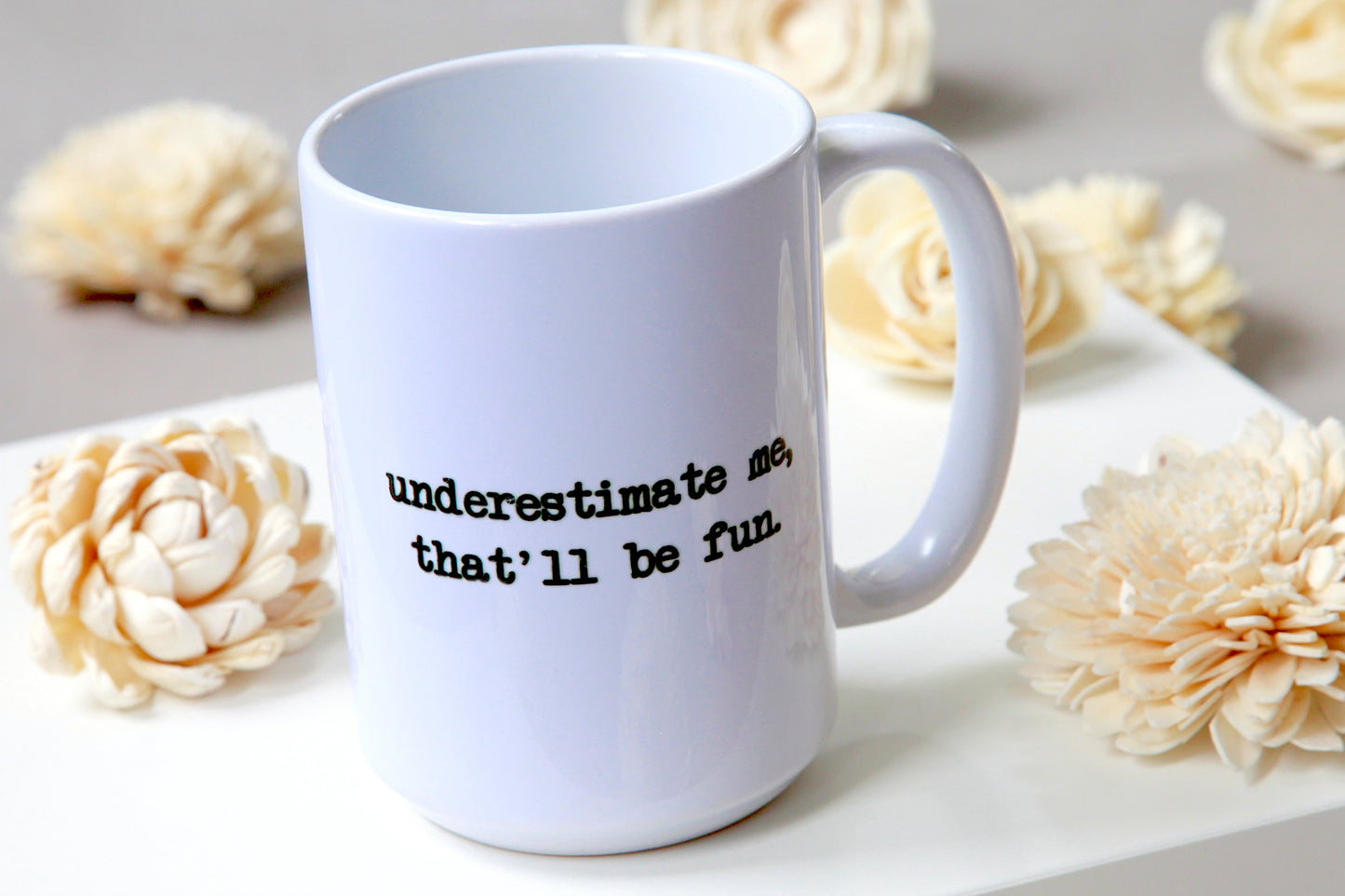 underestimate me- mug 15oz